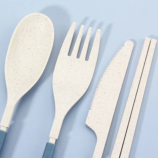 Set of kawaii utensils including a spoon, fork, and knife on a light blue background with text about exquisite workmanship.