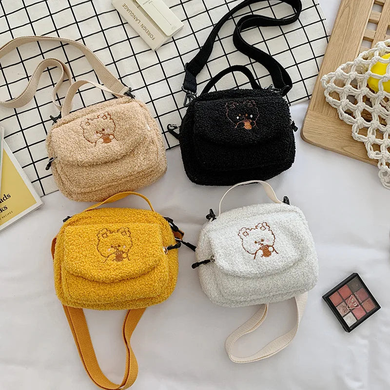 Four small bags with Kawaii teddy bear designs on a checkered background