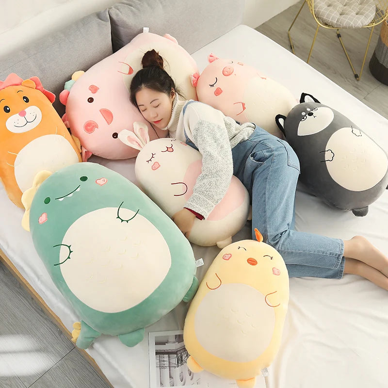 Person lying on a bed surrounded by colorful kawaii animal-shaped cushions.