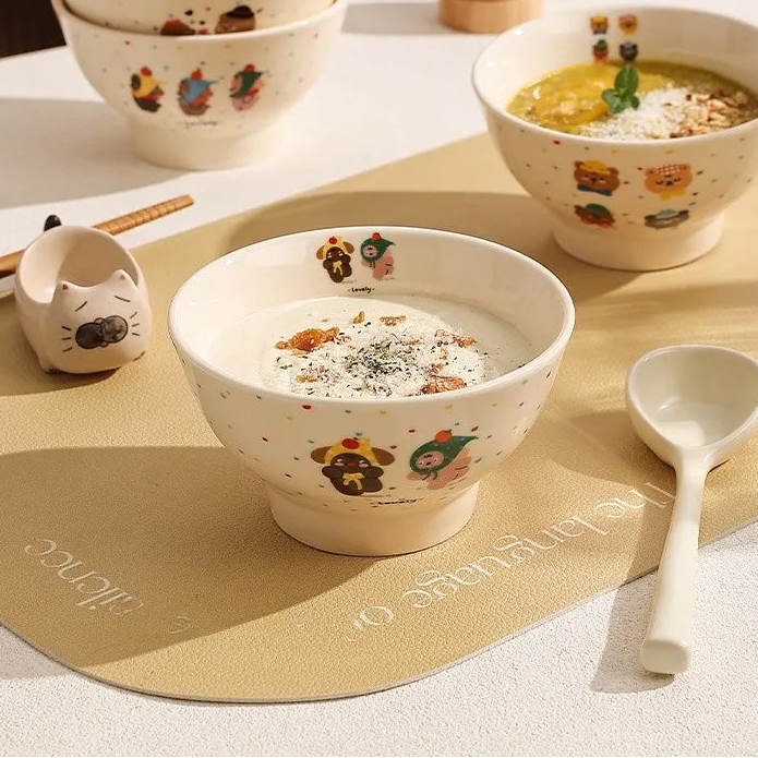 Ceramic kawaii ramen bowls with bear pattern on a wooden surface