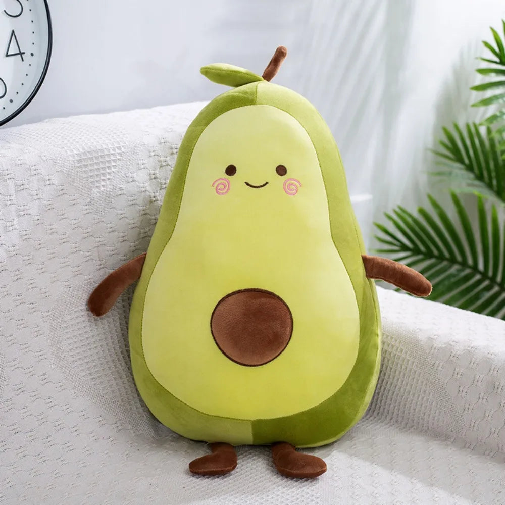Kawaii plush avocado toy with a smiling face on a white surface