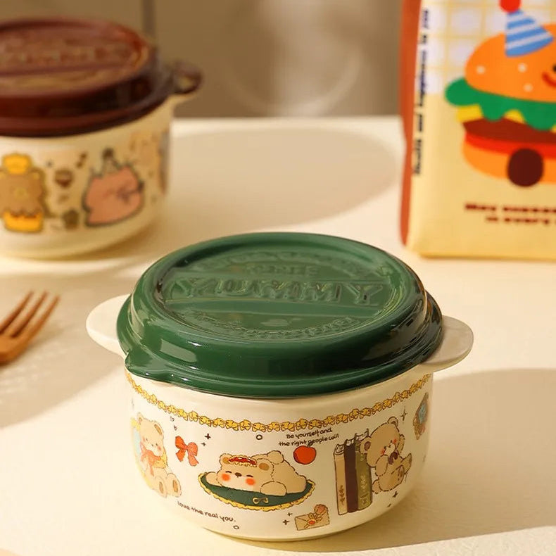 Ceramic kawaii ramen bowl with green lid on a table with a product packaging in the background.