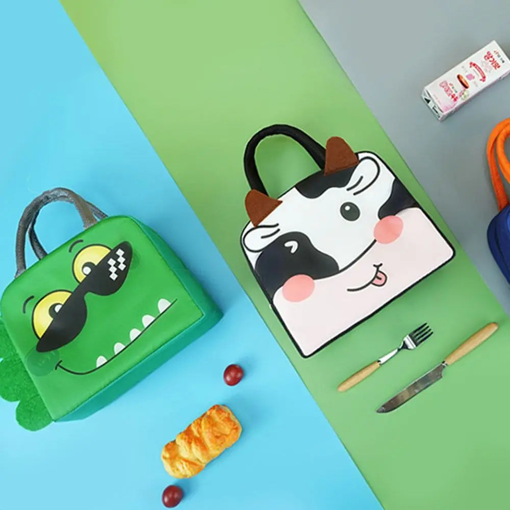 Two cartoon-themed kawaii lunch bags on a colorful background with food items.
