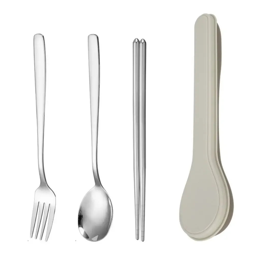Set of silver kawaii utensils with a beige spoon holder on a white background