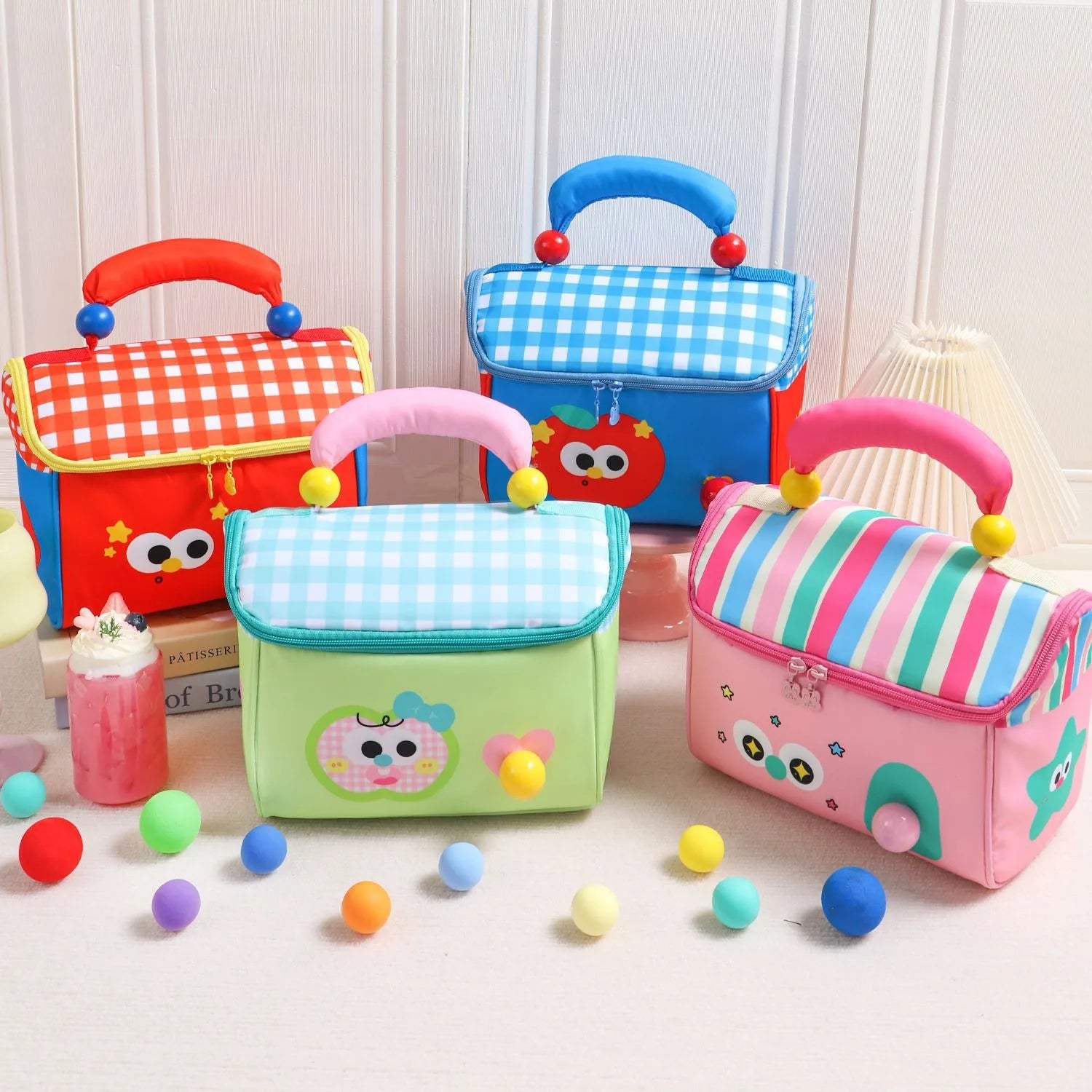 Colorful children's kawaii bags with cartoon faces on a light background