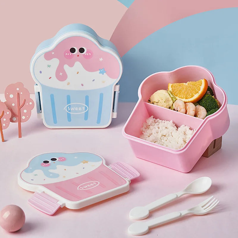 Kawaii-themed bento box set with pink and blue design on a pastel background