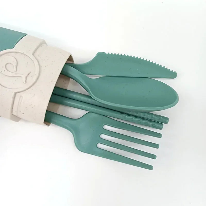A close of a set of green kawaii utensils