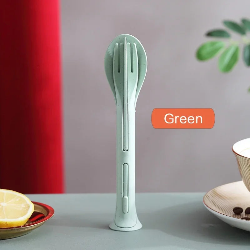 Green kitchen kawaii utensils on a table with a red and gray background