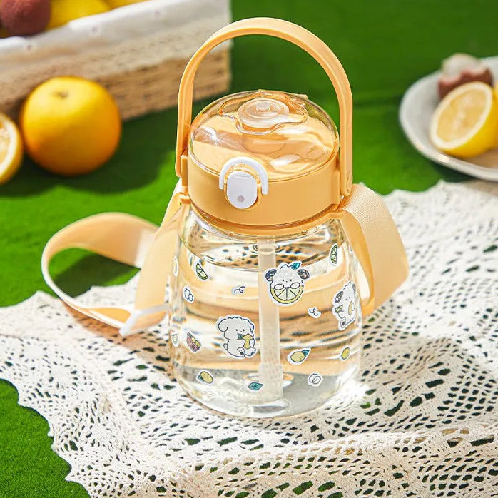 Clear kawaii water bottle with lemon yellow accents on a green background with fruits.