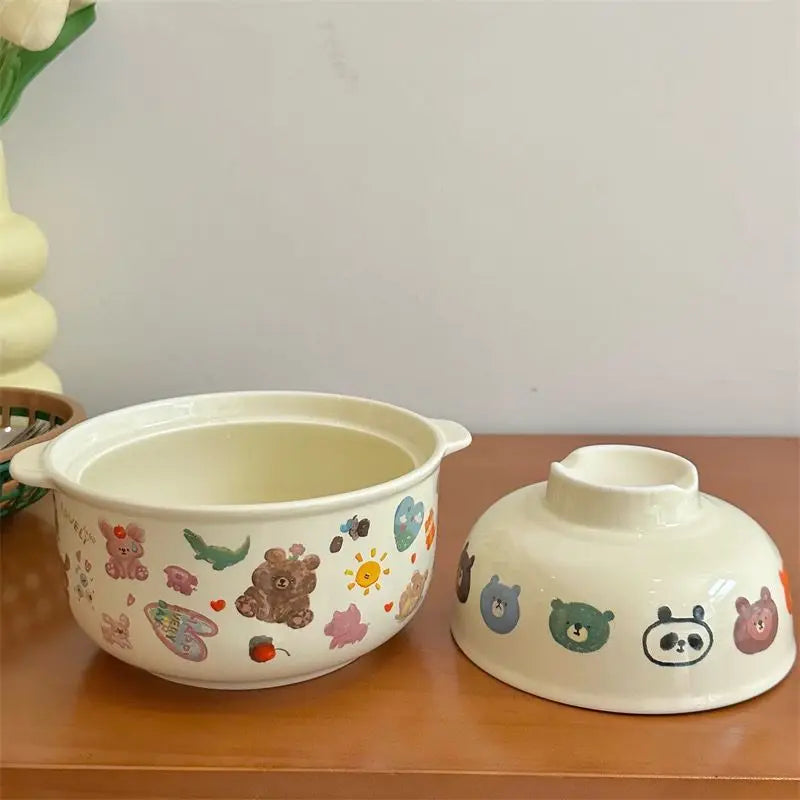 Two ceramic kawaii bowls with cartoon designed on it