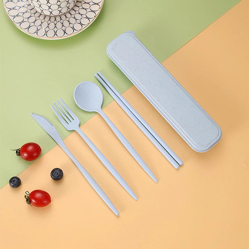 Set of silver kawaii cutlery with a carrying case on a colorful background