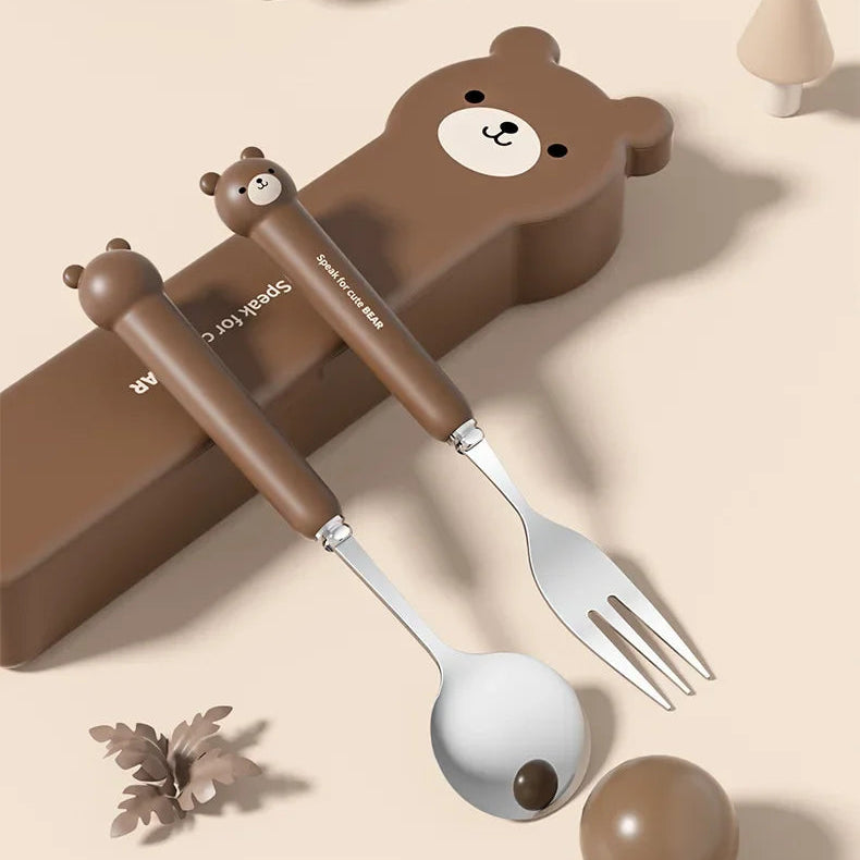 Bear-shaped kawaii utensils set with spoon and fork on a beige background