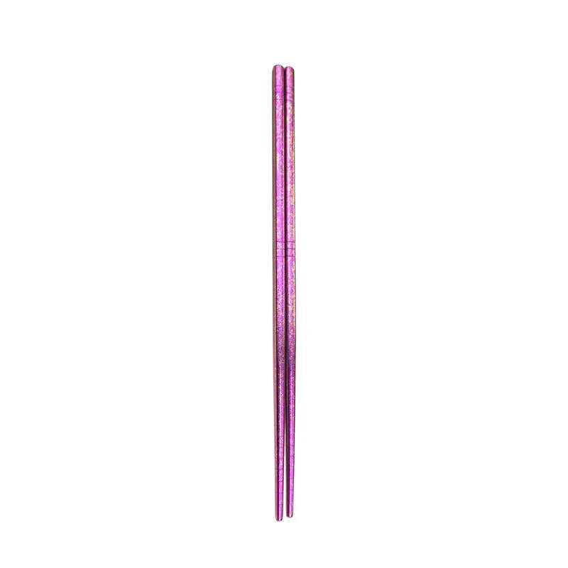 Purple kawaii chopsticks on a white background