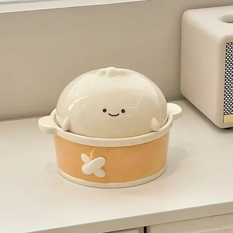 A white and yellow smiley faced designed kawaii ramen bowl sitting on a table