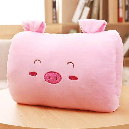 Pink pig-shaped kawaii cushion on a wooden surface with a blurred background