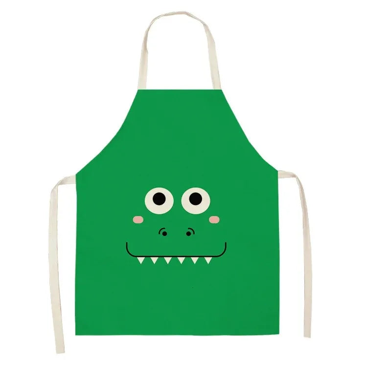 Green kawaii apron with a cartoon dinosaur face design on a white background