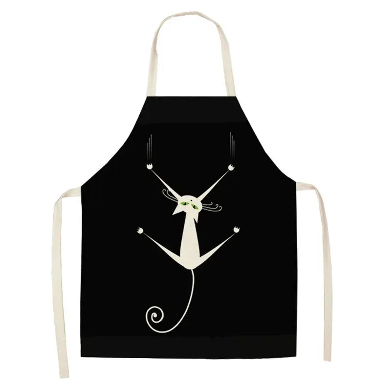 Black apron with a white cat Kawaii design on a white background