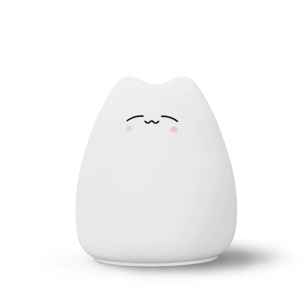 White kawaii cat-shaped night light with a simple face on a white background