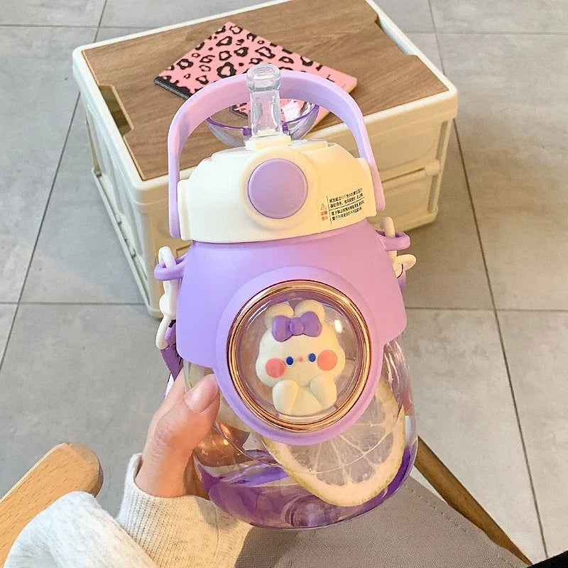 Children's kawaii water bottle with cartoon character on a wooden surface