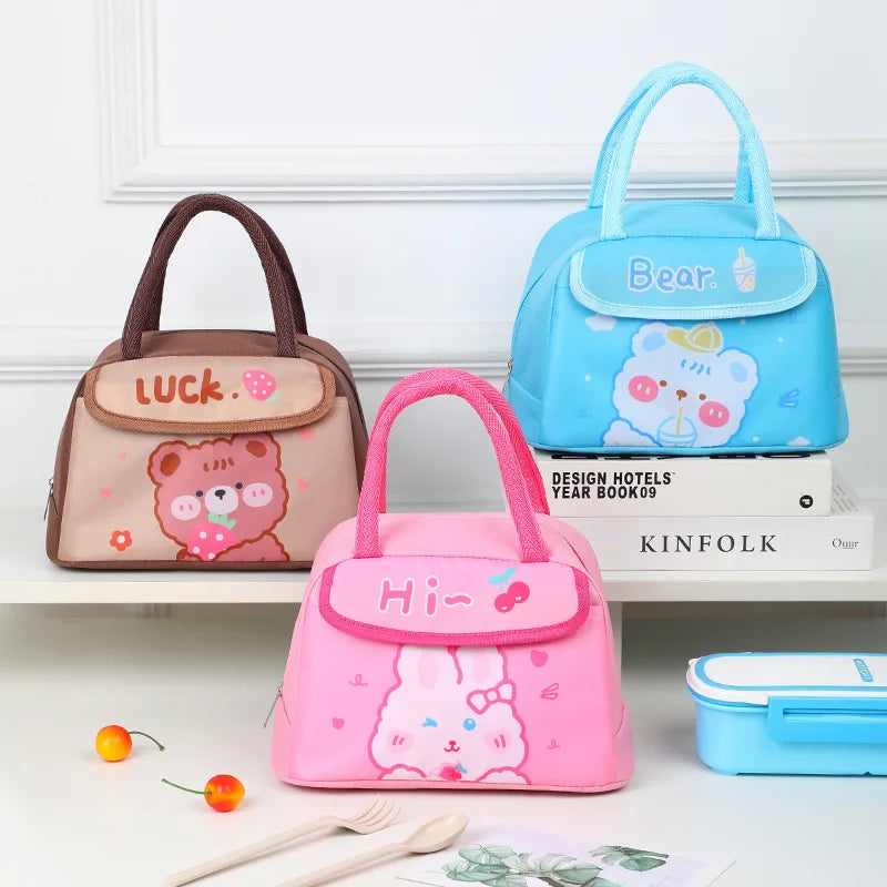 Three colorful children's kawaii bags with cartoon designs on a shelf.