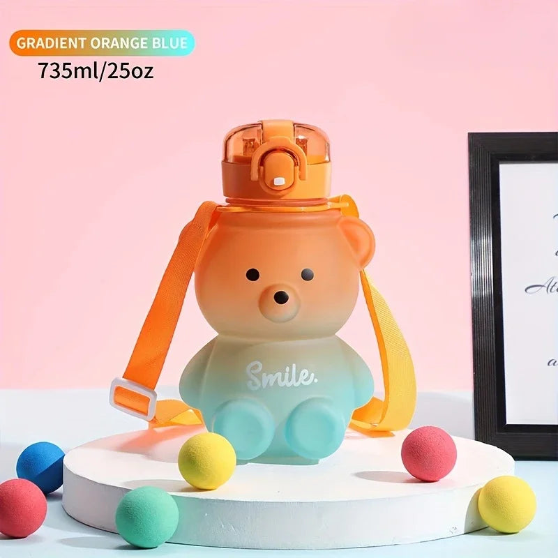 Gradient orange to blue bear-shaped kawaii water bottle on a pink background
