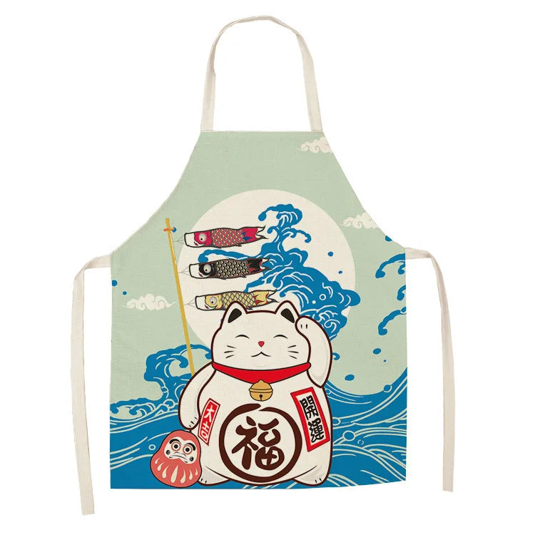 Kawaii apron with a cartoon cat design and wave background on a light green background