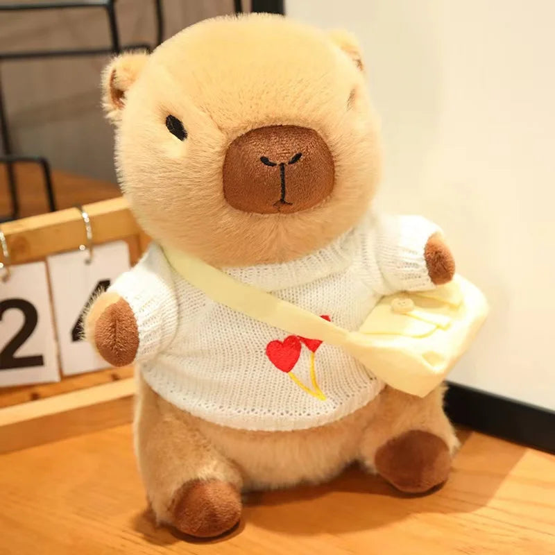 Kawaii plush bear toy wearing a white shirt with a heart design on a wooden floor.