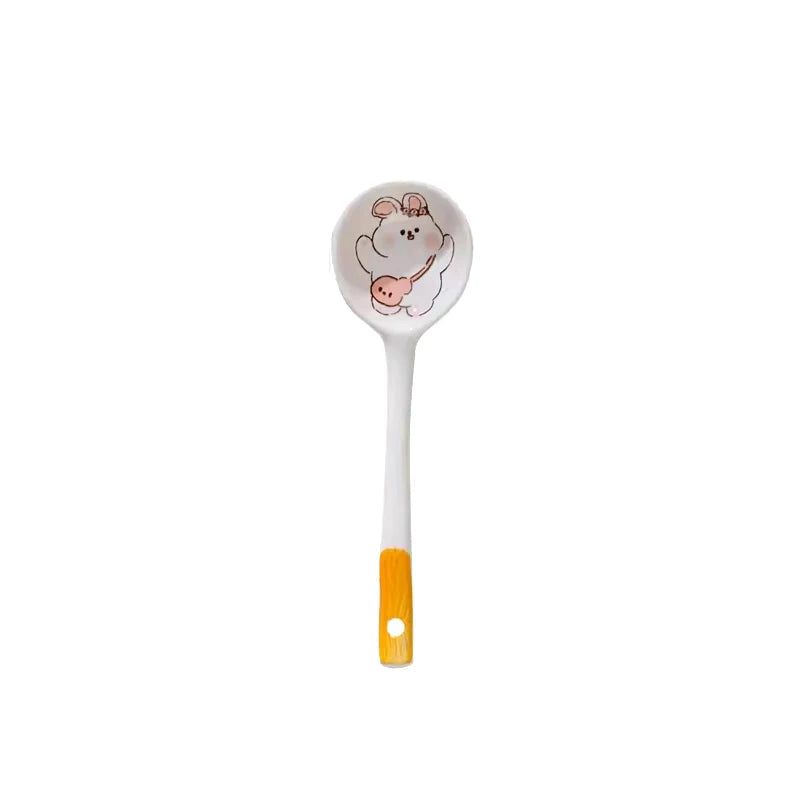 A white kawaii spoon with a rabbit design on a white background