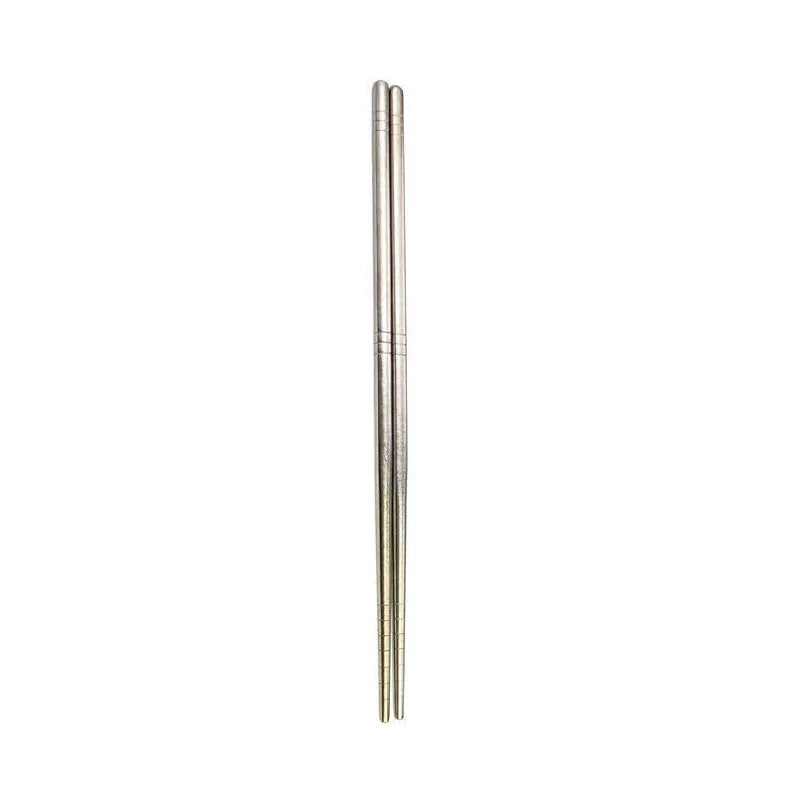 Two metallic kawaii chopsticks on a white background