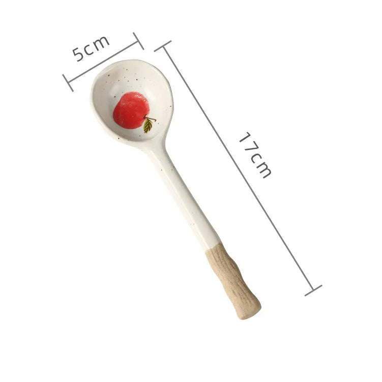 A white ceramic kawaii spoon with measurements