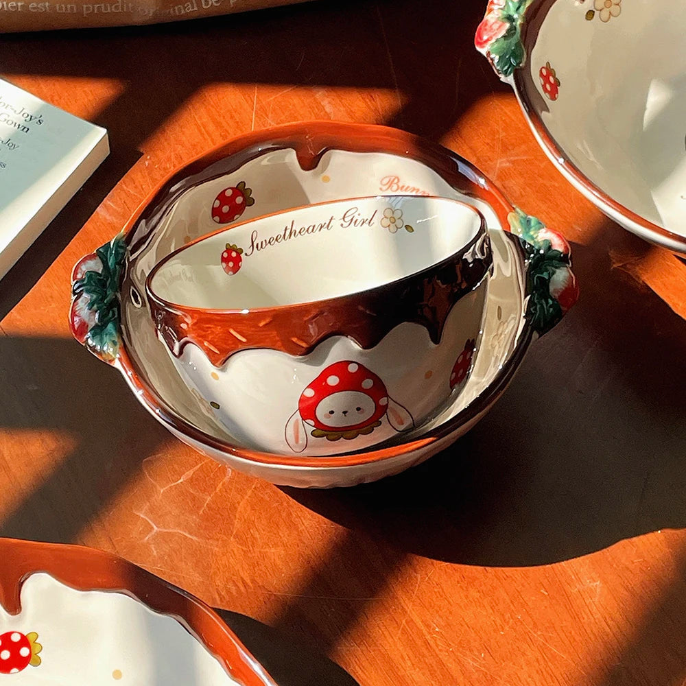 Ceramic kawaii ramen bowl with decorative elements on a wooden surface
