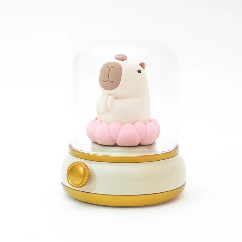 Decorative kawaii capybara figurine on a white background