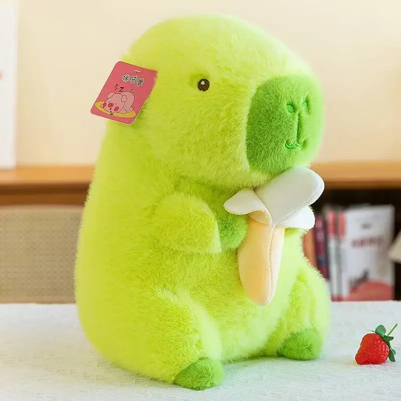 Green kawaii plush toy with a strawberry on a light background