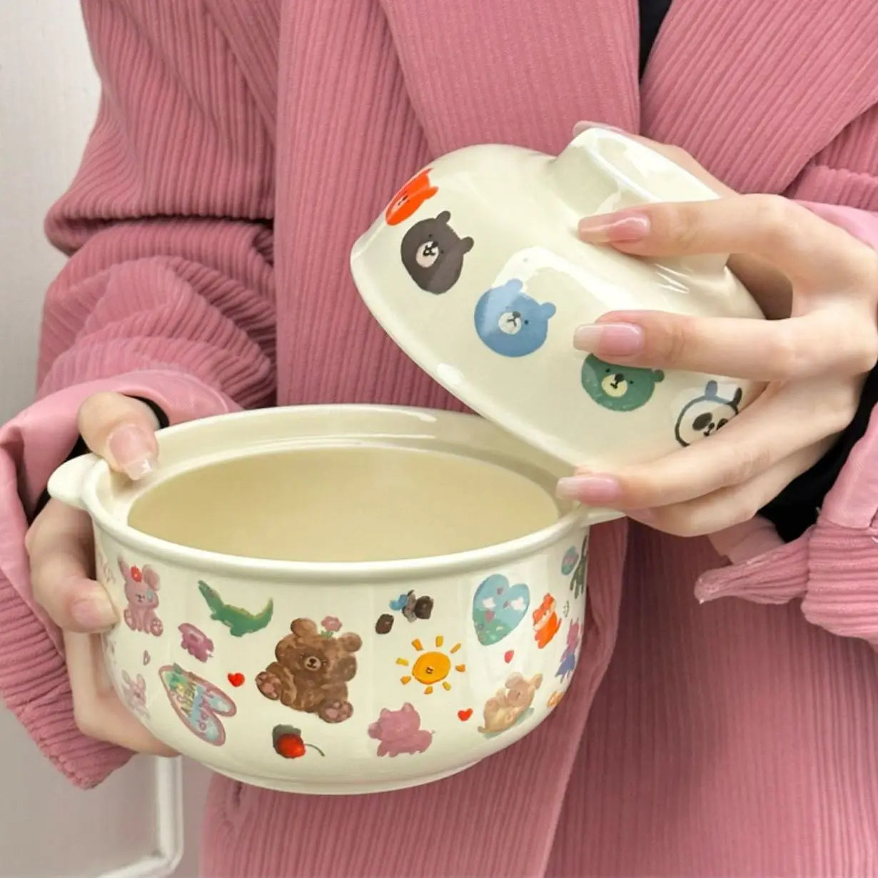 A white kawaii bowl with cartoons designed on it