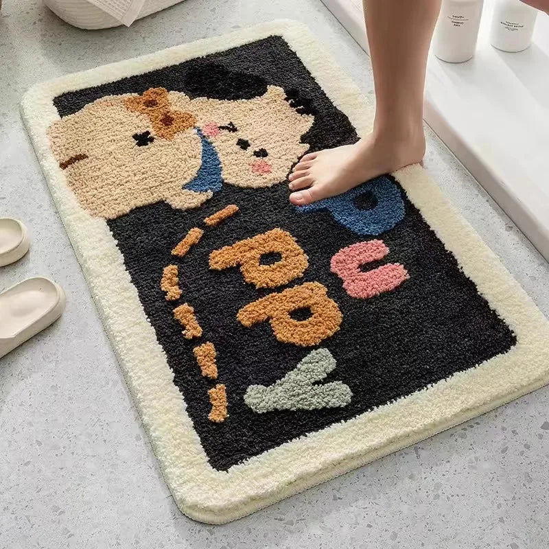 Decorative bath mat with Kawaii cartoon characters and 'Happy' text on a bathroom floor.
