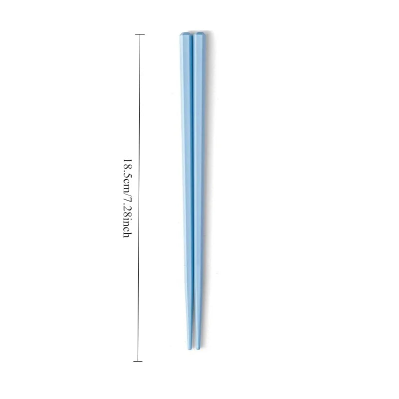 Two blue kawaii chopsticks with measurements on a white background