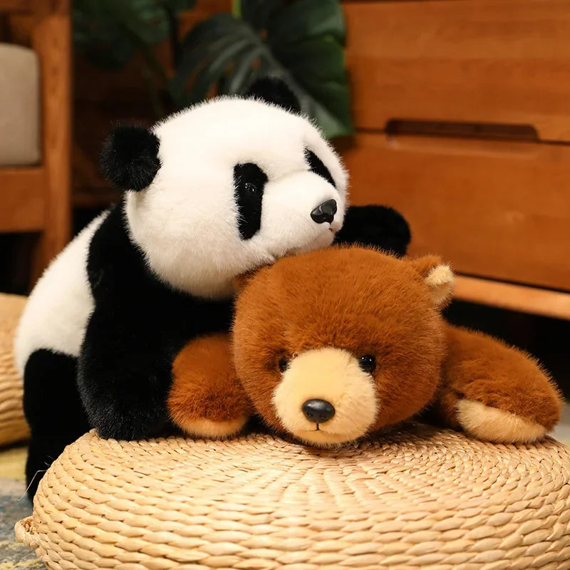 Kawaii plush panda and bear sitting together on a woven surface with a blurred indoor background