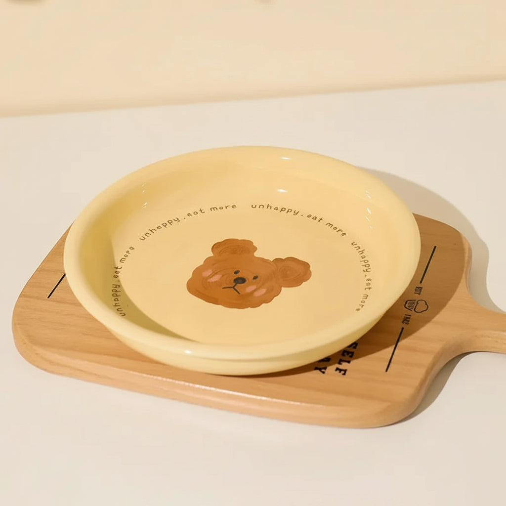 Yellow kawaii ramen plate with a bear design on a wooden board, showing measurements.