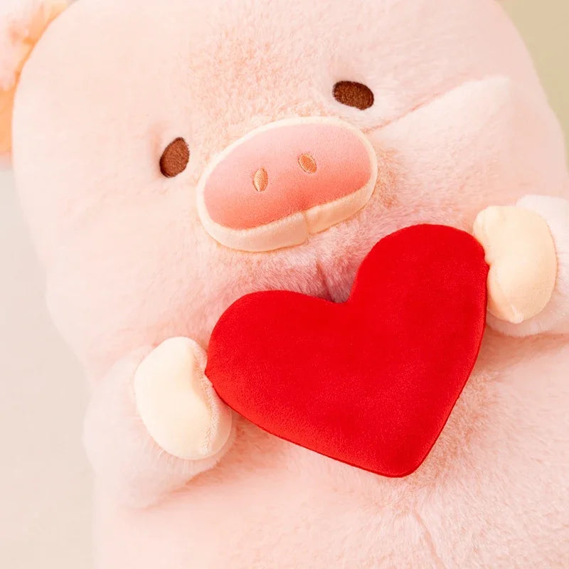 Kawaii plush toy pig holding a red heart on a light background