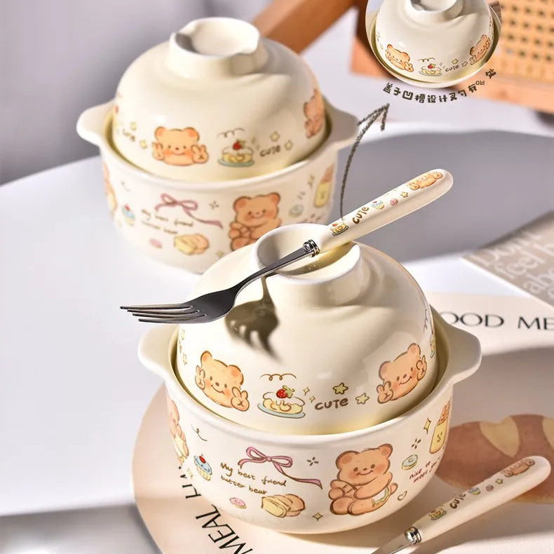 Set of ceramic kawaii ramen bowls with bear designs on a white surface