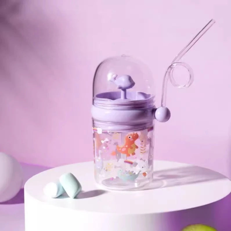 Kawaii tumbler with straw and lid on a pink background