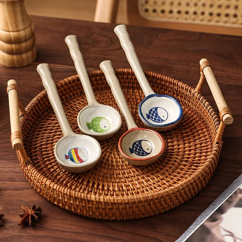 Four kawaii spoons on a tray