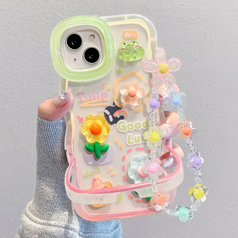 Colorful phone case with kawaii floral design and chain holder on a gray background