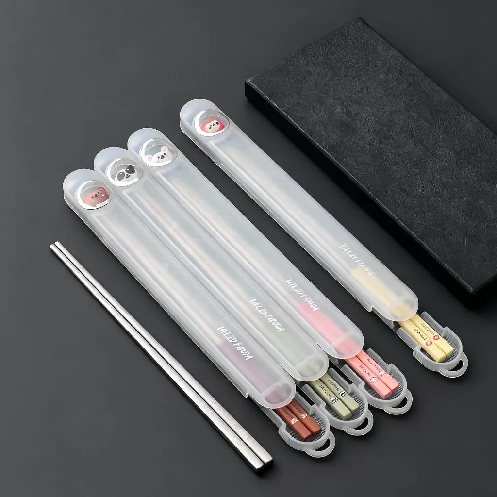 Set of colorful kawaii chopsticks in transparent cases on a dark background