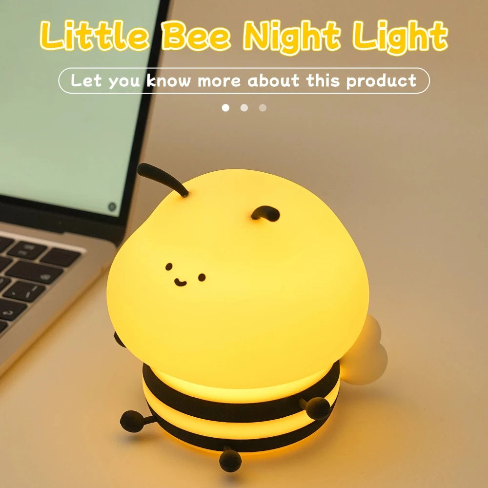 Yellow bee kawaii night light on a desk next to a laptop with text 'Little Bee Night Light' and 'Let you know more about this product'.