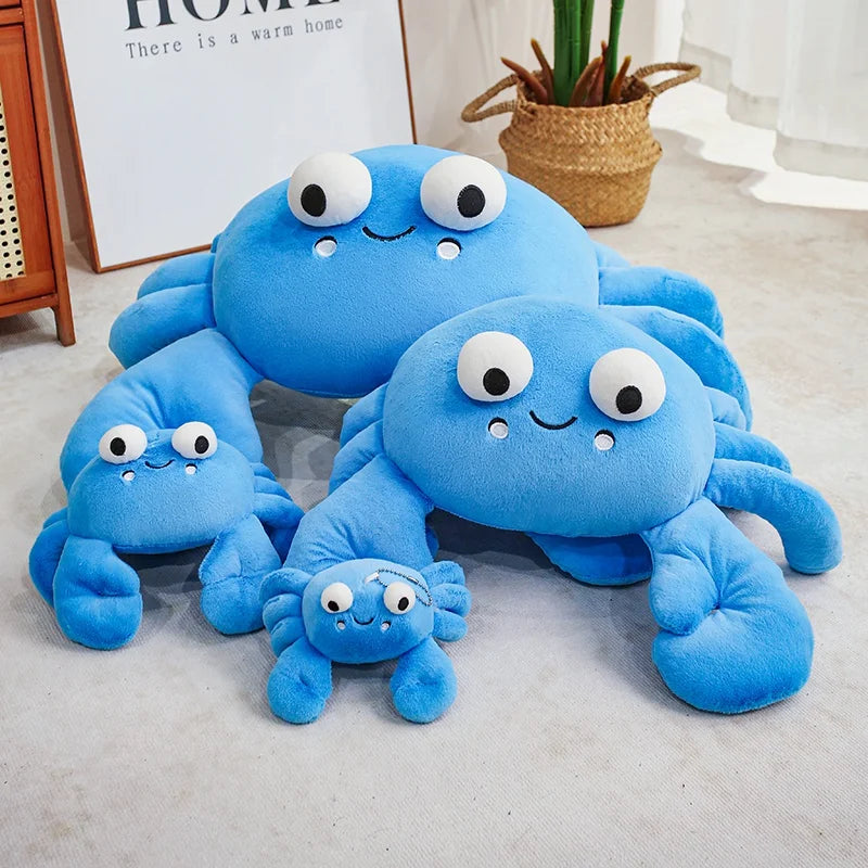 Set of blue crab kawaii plush toys on a light-colored floor.