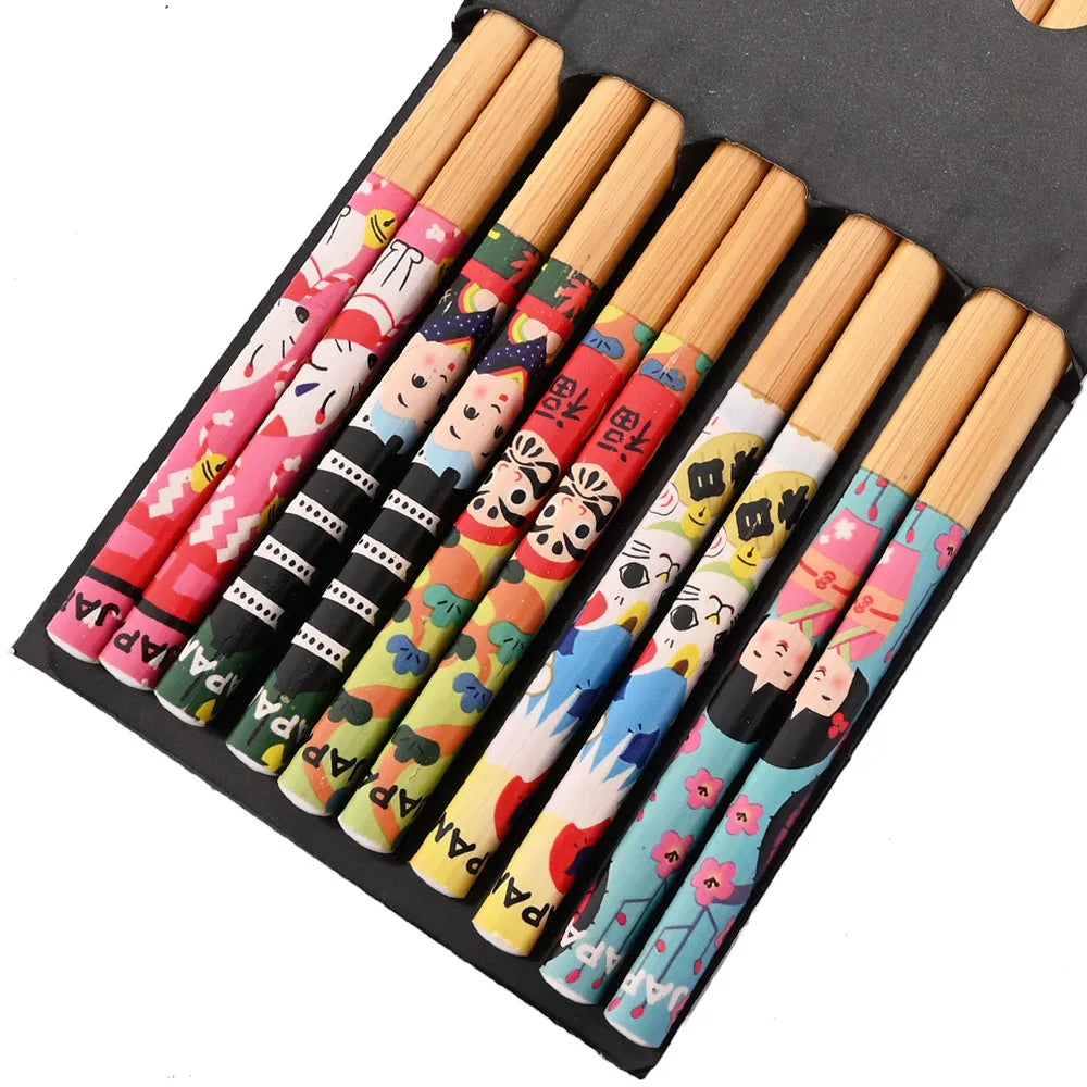 Set of colorful cartoon-themed kawaii chopsticks in a black case
