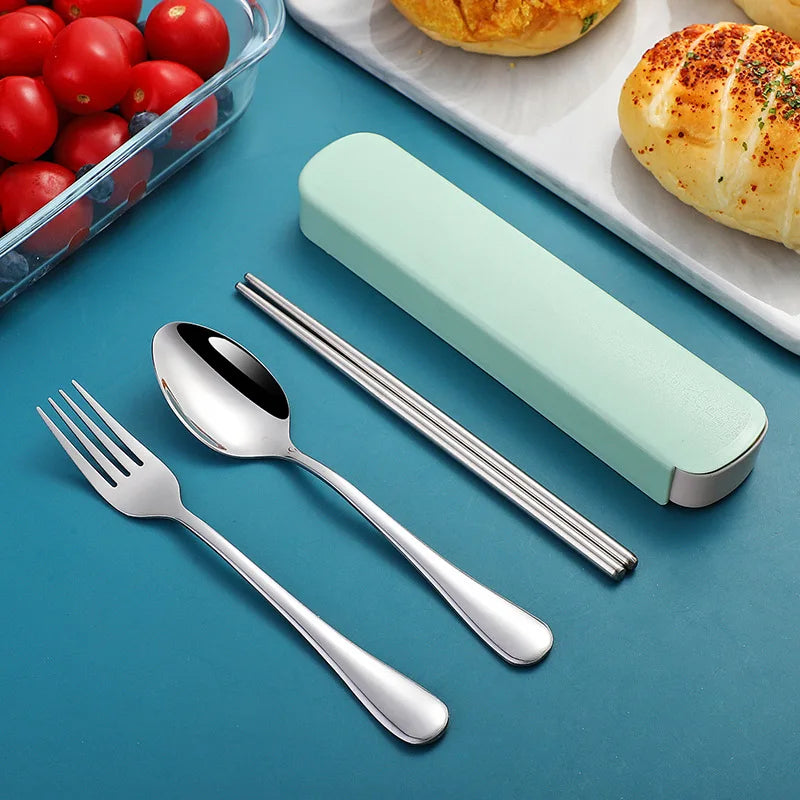 A set of kawaii utensils with a green case