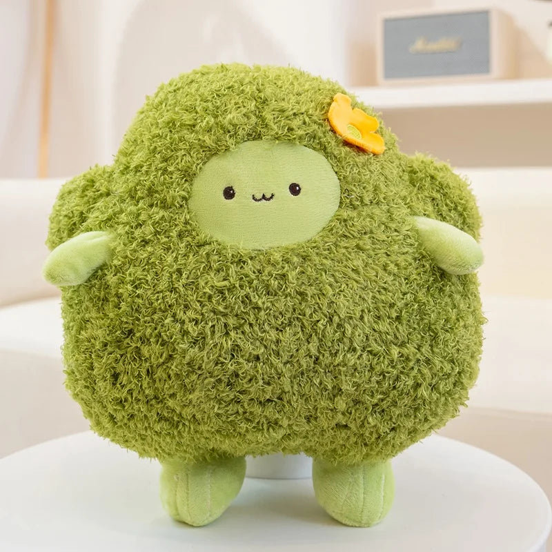 Green kawaii plush toy with a happy expression on a white surface