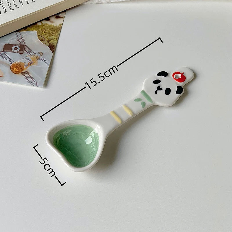 A panda ceramic kawaii spoon on a table